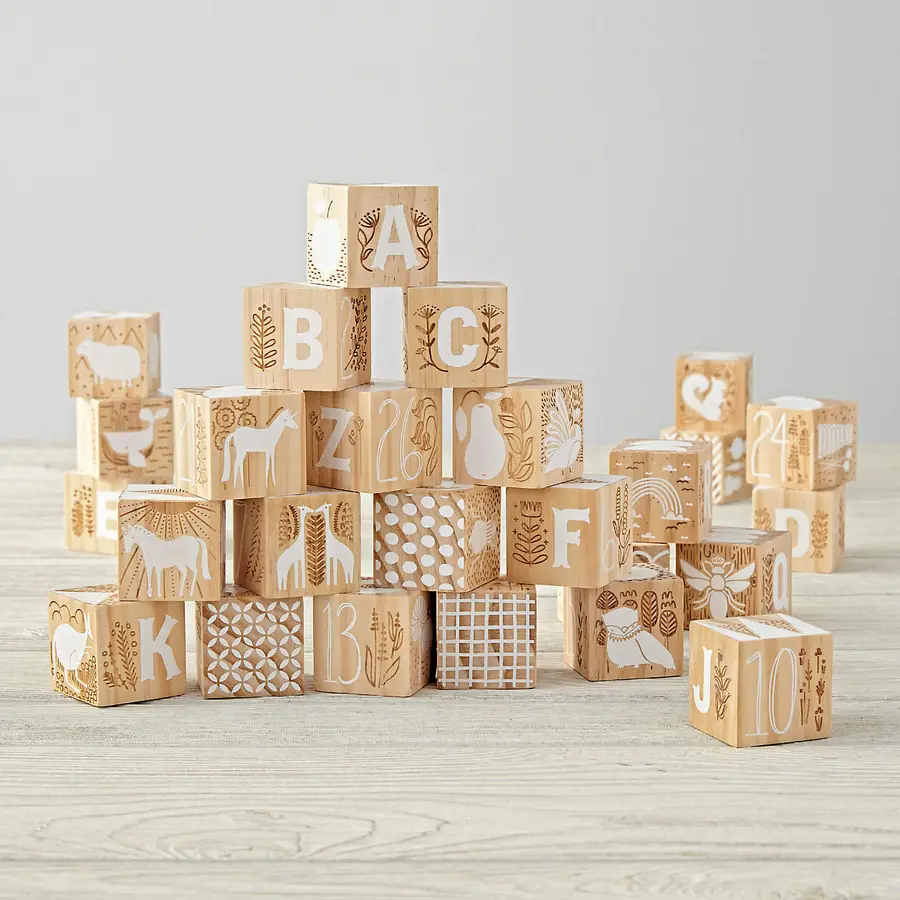 Baby blocks, sidewalk chalk, and other toys