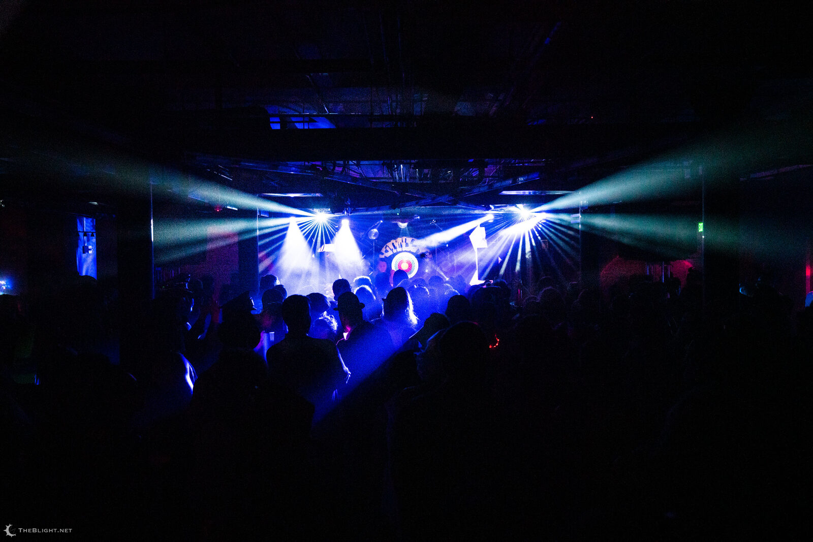 Light beams over the What Doesn't Kill You Makes You Stranger dance floor